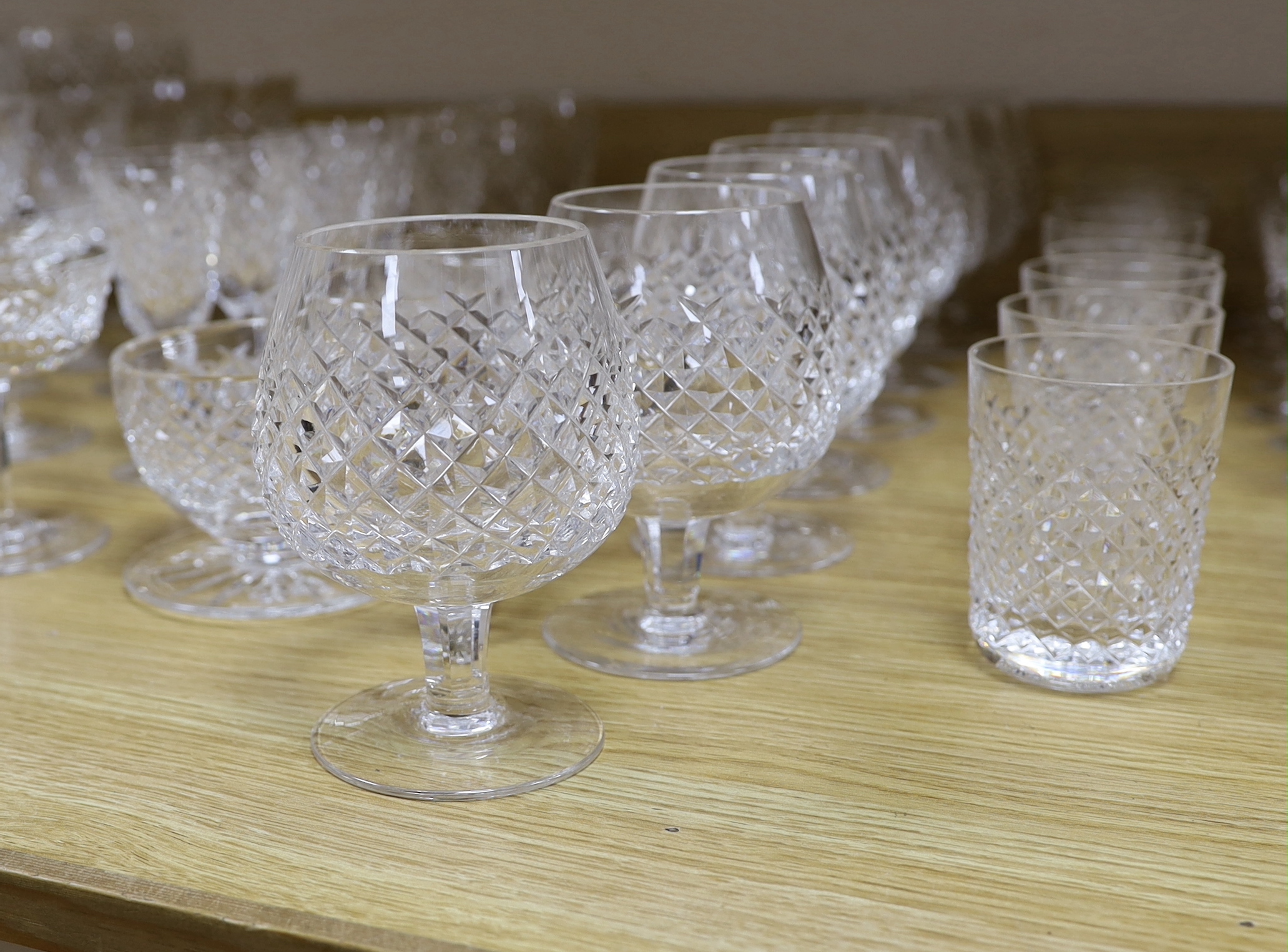 A part suite of Waterford drinking glassware, including champagne glasses, brandy glasses, liquor glasses, wine glasses, etc (61)